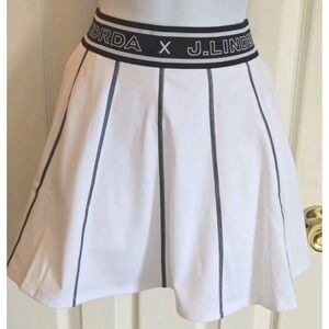 J Lindeberg Nelly Korda Womens Golf Skirt Size XS White and Navy Blue NEW w/Tags